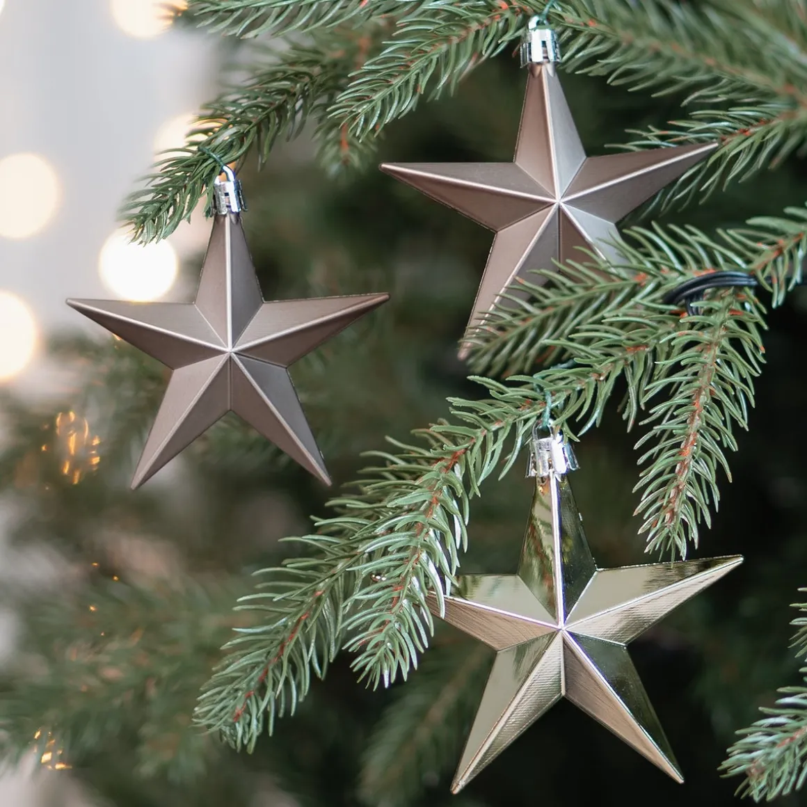 Kunststof Kerststerren 10 Cm Taupe 12 Stuks